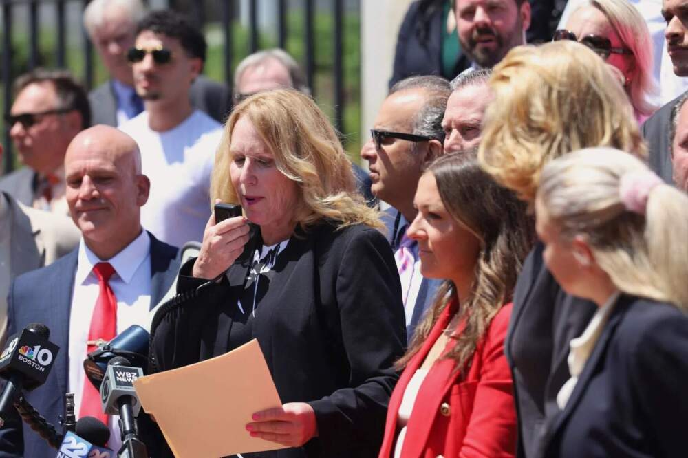 Jennifer O’Brien, a bar advocate, speaks at a rally outside the State House on May 27. (SHNS)