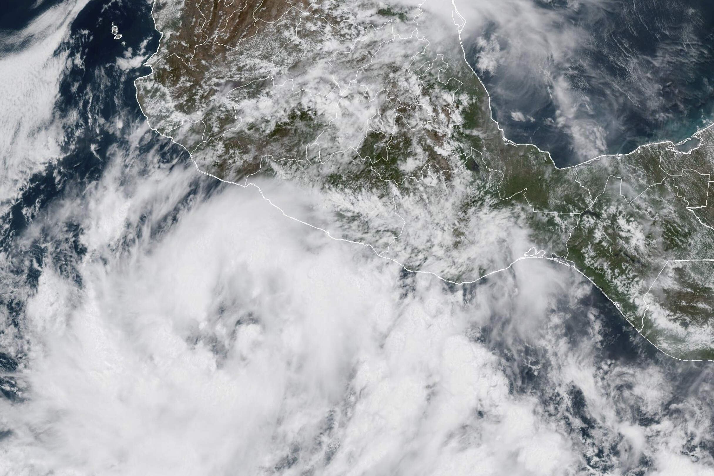 This GOES-19 GoeColor satellite image taken Friday, June 13, 2025, at 1:40 p.m EDT, and provided by NOAA shows Tropical Storm Dalila in the eastern Pacific Ocean just south of the southwestern coast of Mexico. (NOAA via AP)