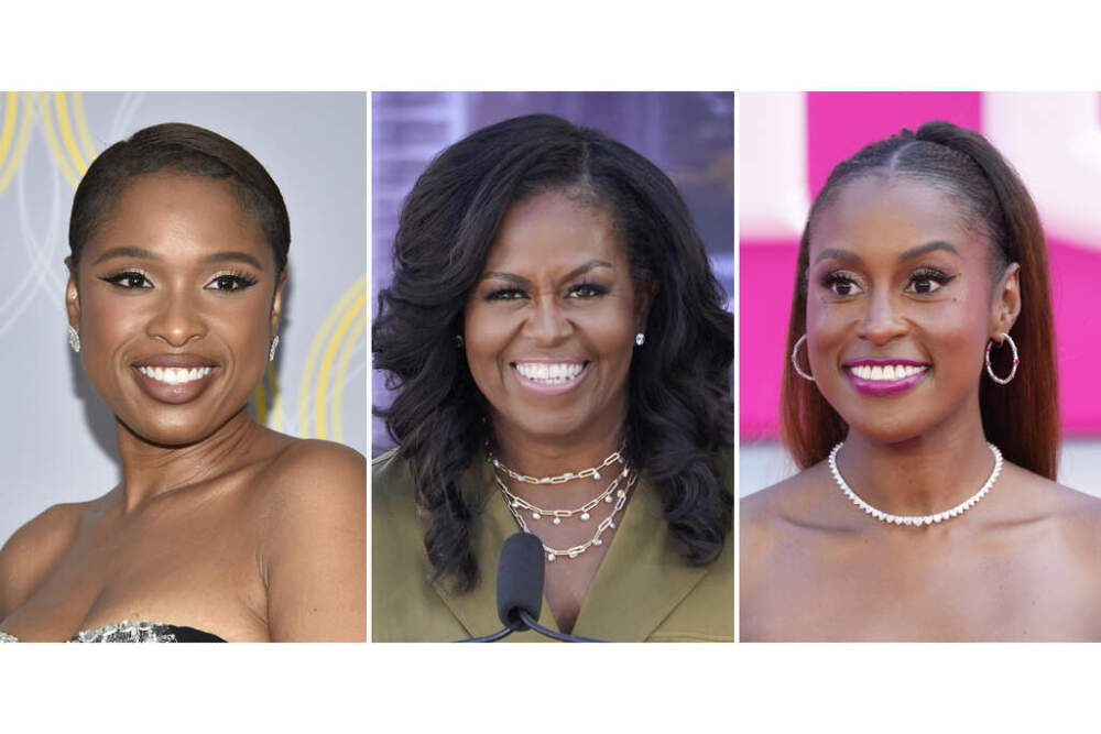 Jennifer Hudson, left, Michelle Obama, center, and Issa Rae. (AP Photo)