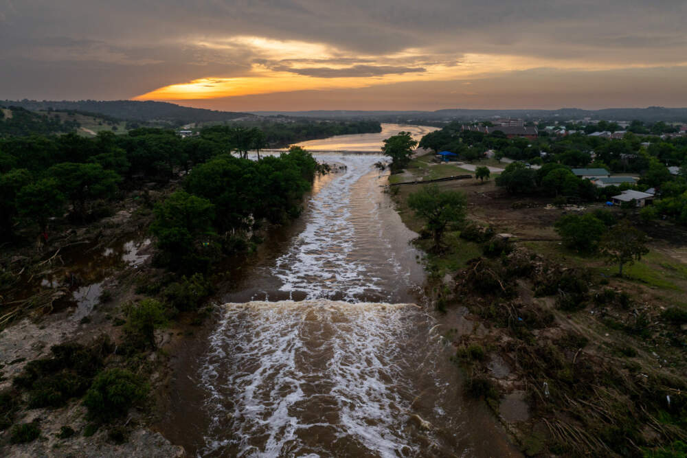 In an aerial view, the sun sets over the Guadalupe River on July 06, 2025 in Kerrville, Texas. (Brandon Bell/Getty Images)