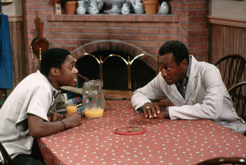 Malcolm-Jamal Warner acts with Bill Cosby in a scene from "The Cosby Show." (Jacques M. Chenet/Corbis via Getty Images)