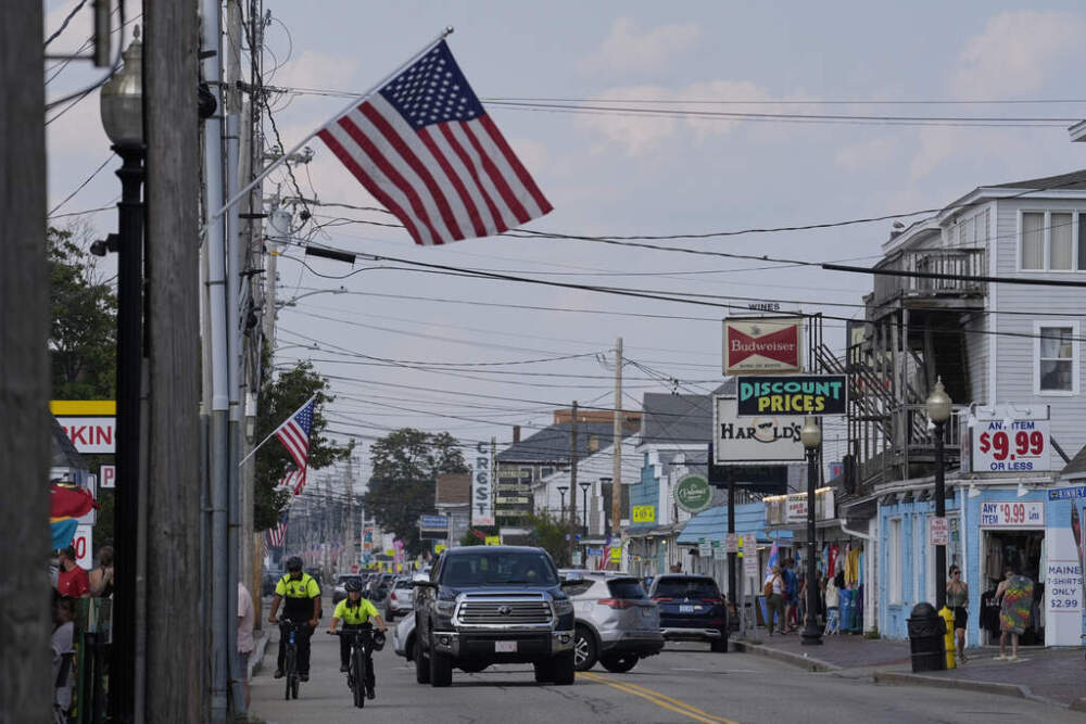 Community Service Officers from the Old Orchard Beach Police Department patrol on bicycles, Tuesday, July 29, 2025, in Old Orchard Beach, Maine. (Robert F. Bukaty/AP)