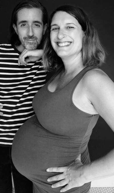 The author and her partner, Rob, during her pregnancy. The couple conceived using a donor egg. (Courtesy Ruthie Ackerman)