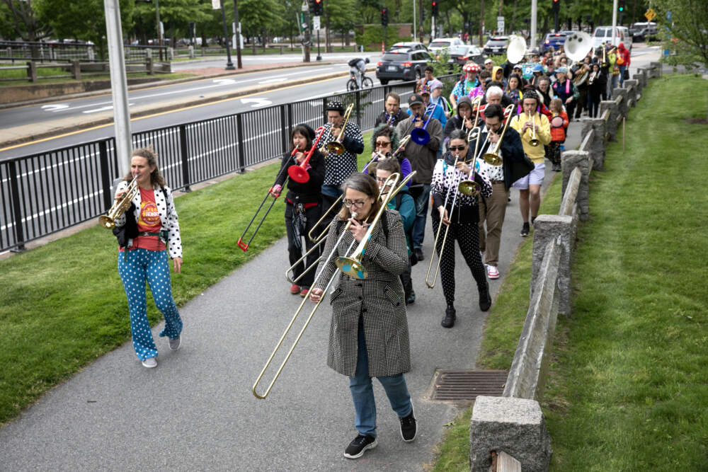 The School of Honk goes on a practice march along Cambridge Street, in Cambridge, Mass. (Robin Lubbock/WBUR)