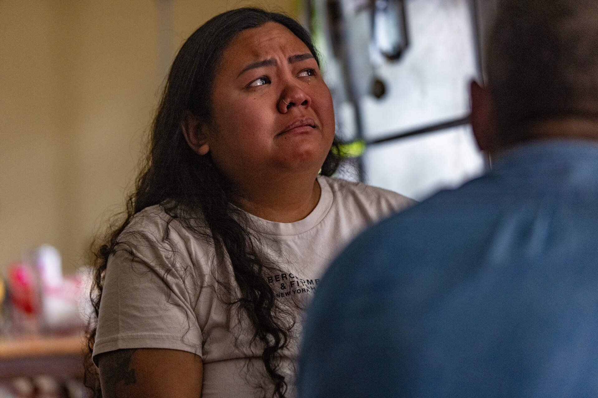 Vanny Ly talks about her husband, Samath Thoeun, being detained by ICE. (Jesse Costa/WBUR)