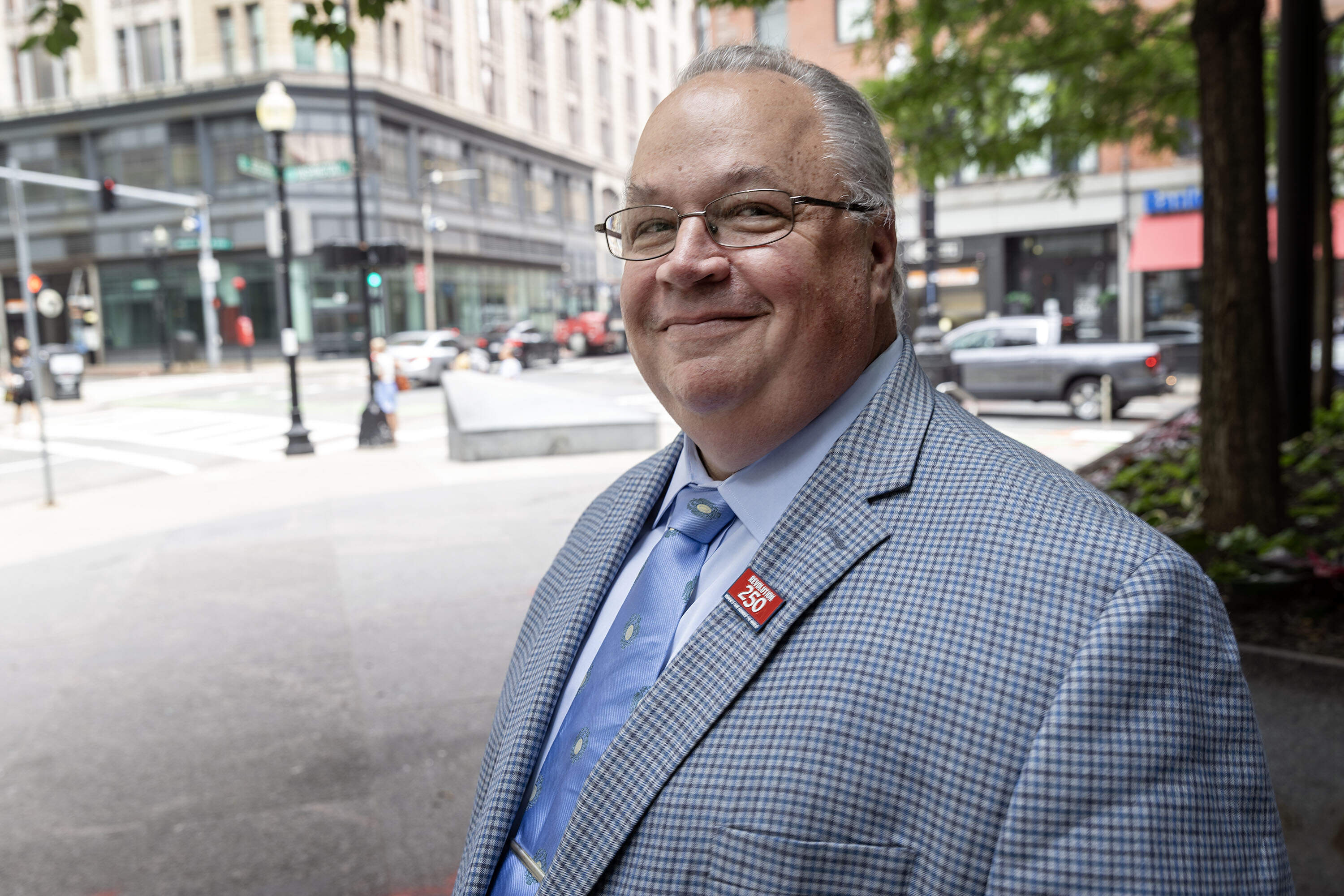 Jonathan Lane, executive director of Revolution 250, in Liberty Tree Plaza. (Robin Lubbock/WBUR)