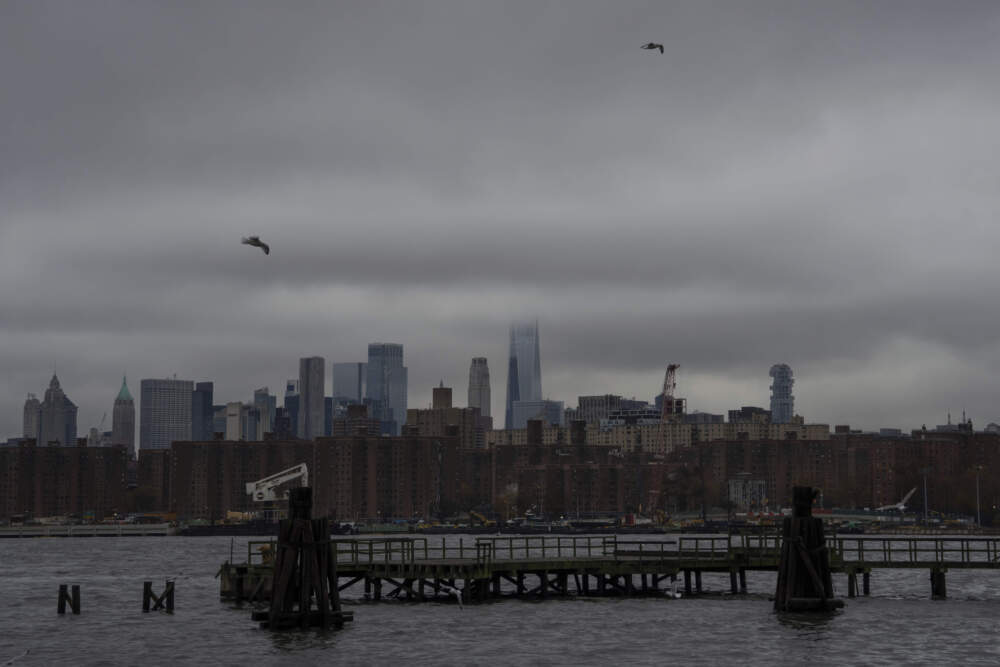 One World Trade Center is shrouded in heavy cloud during a break in the rain. (Adam Gray/AP)