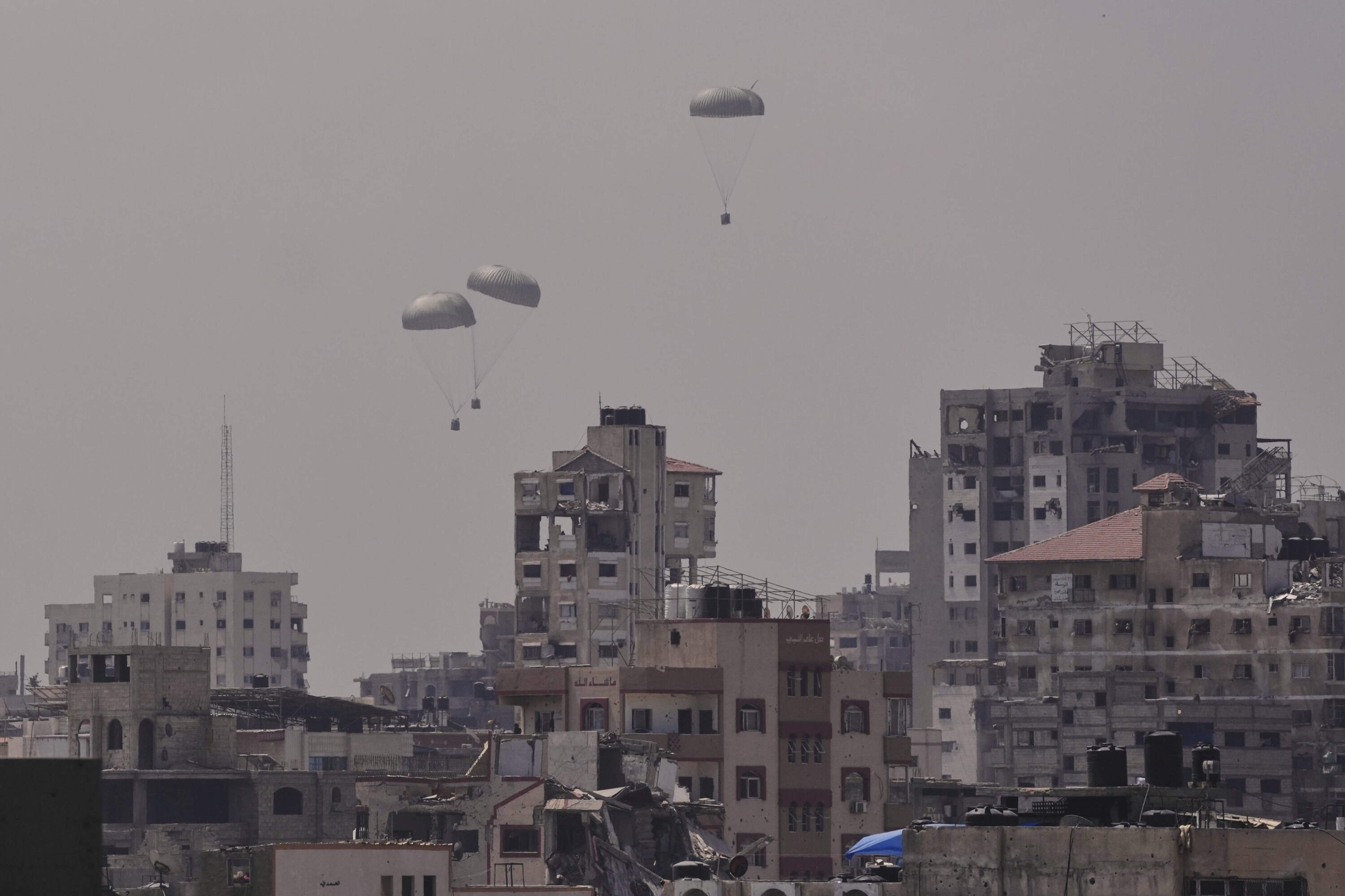 Humanitarian aid is airdropped to Palestinians over Gaza City, northern Gaza Strip, Friday, Aug. 8, 2025. (Jehad Alshrafi/AP)