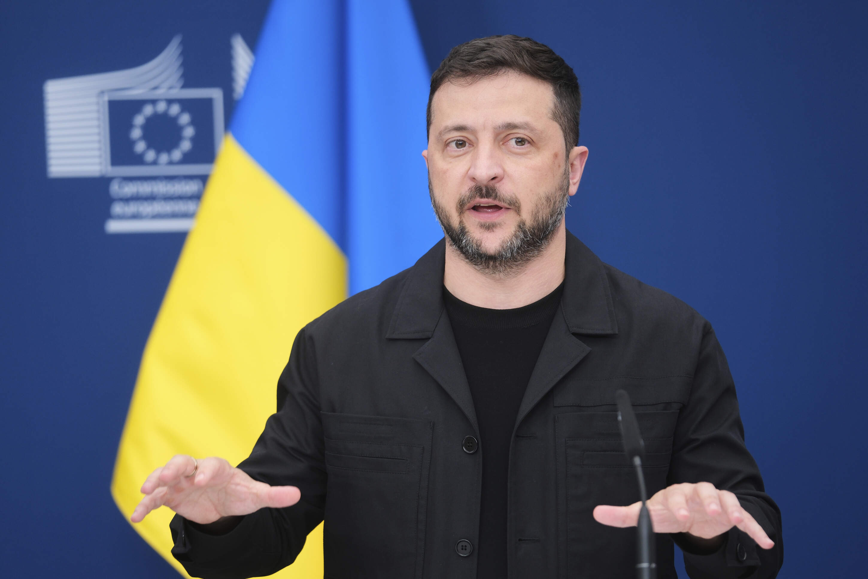 Ukraine's President Volodymyr Zelenskyy speaks during a media conference at EU headquarters in Brussels, Belgium, Sunday, Aug. 17, 2025. (AP Photo)