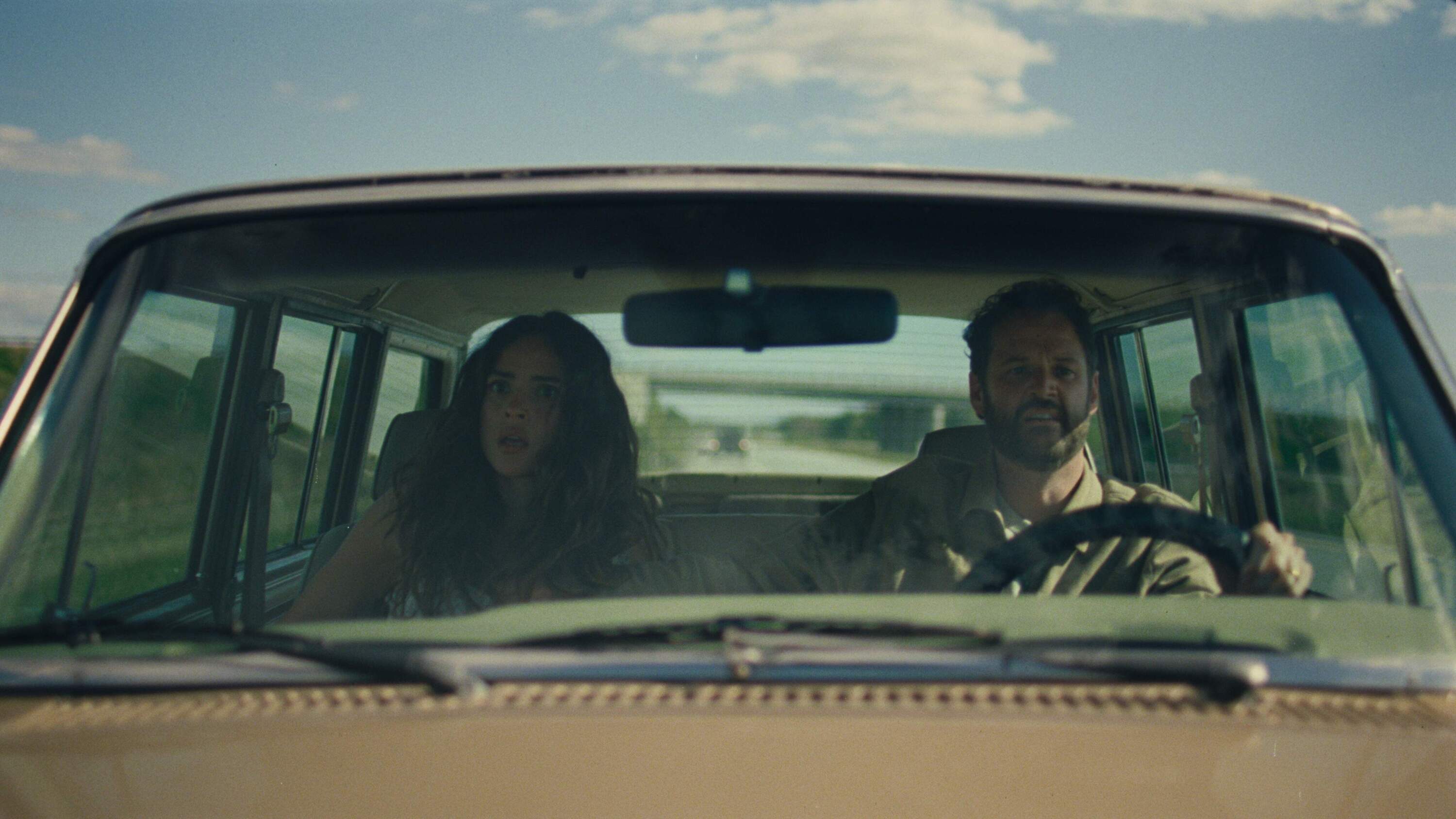 Adria Arjona and Kyle Marvin in "Splitsville." (Courtesy NEON)