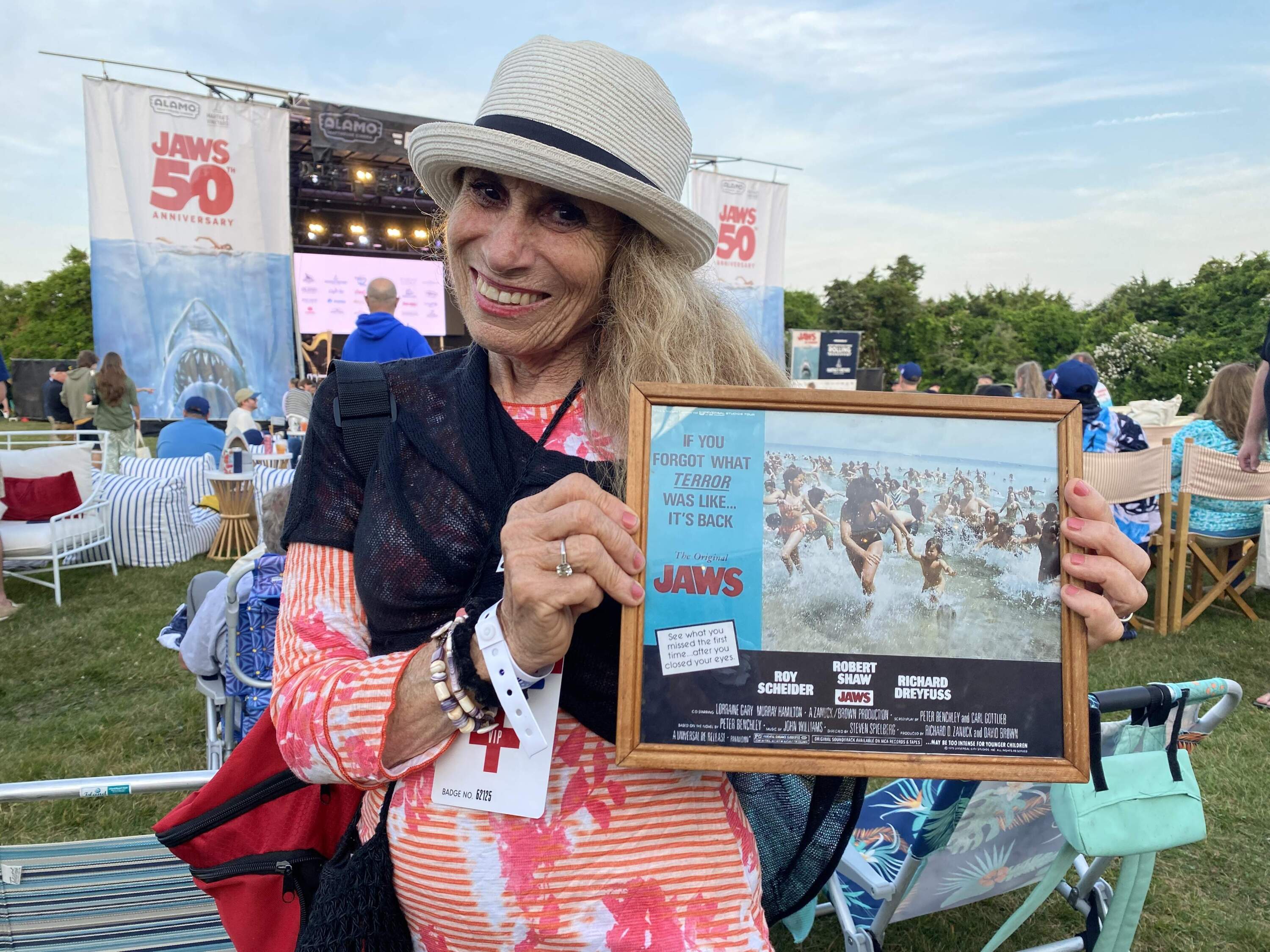 In 1974 Cathy Weiss and her young daughter were extras in the chaotic beach scene caused by two young boys scaring swimmers with a fake shark fin. The photo, taken by Edith Blake, ended up on posters advertising "Jaws" around the world. (Andrea Shea/WBUR)
