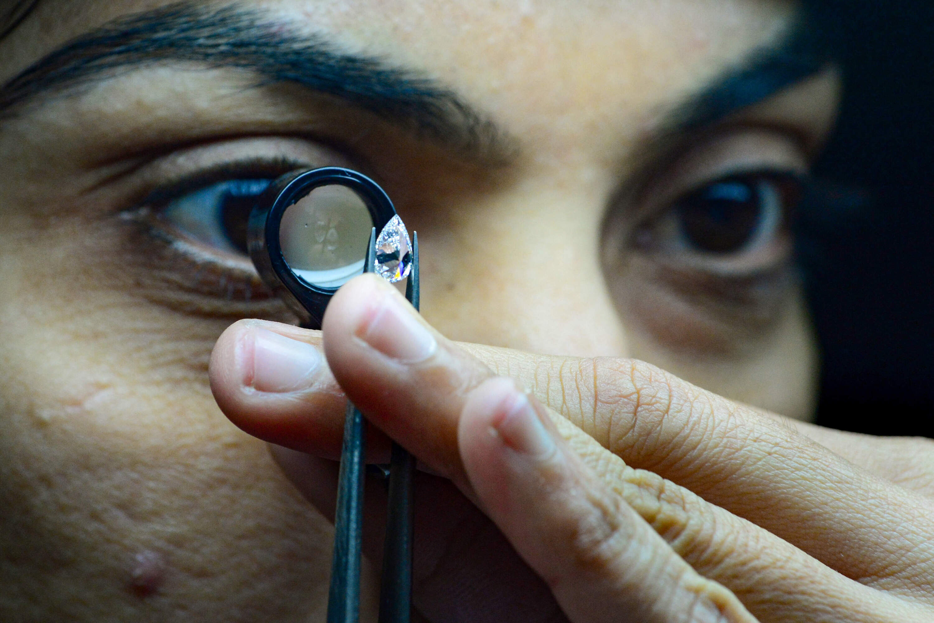 An employees working at Greenlab Diamonds, a firm manufacturing lab-grown gems on the outskirts of Surat, India. (Sam Panthaky/AFP via Getty Images)