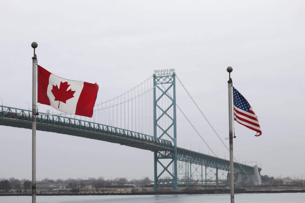 Trucks cross the Ambassador Bridge between Windsor, Canada and Detroit, Michigan. (Bill Pugliano/Getty Images)