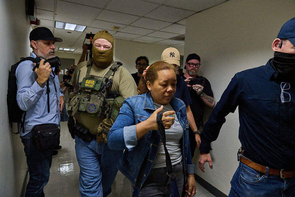 U.S. federal agents working for ICE detain immigrants and asylum seekers reporting for immigration court proceedings at the Jacob K. Javits Federal Building's U.S. Immigration Court in New York, New York, Thursday, July 24. (Dominic Gwinn / Middle East Images via AFP) 