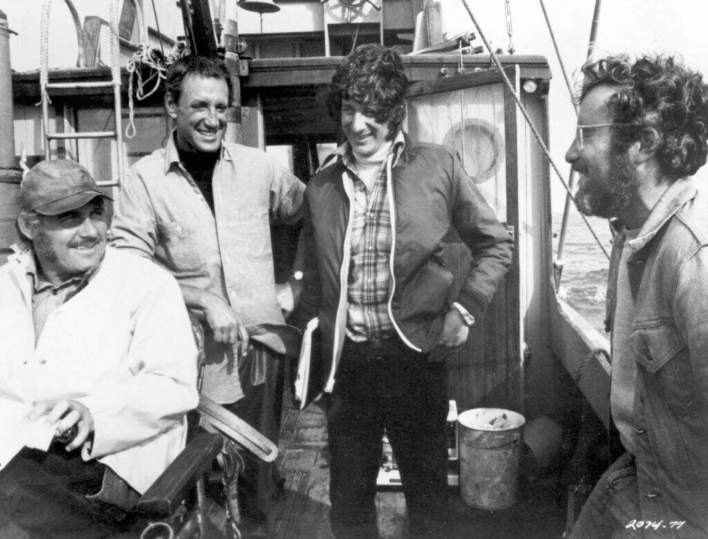 Robert Shaw, Roy Scheider, Steven Spielberg and Richard Dreyfuss laugh together during the filming of Spielberg's "Jaws." (Photo by Universal Studios/Getty Images)