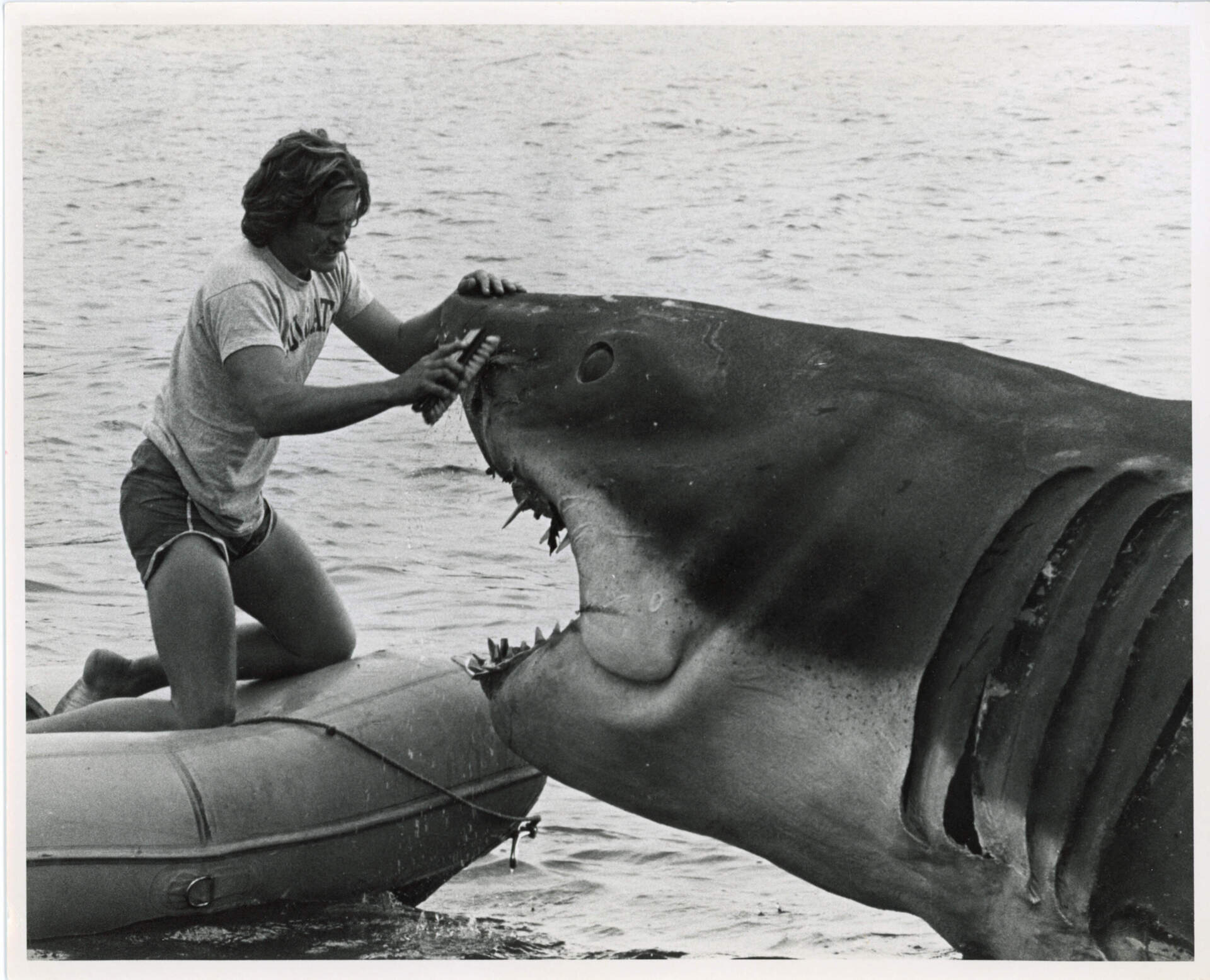 Special effects operative Richie Helmer scrubs the face of the shark prop. (Courtesy of Edith Blake/Martha's Vineyard Museum)
