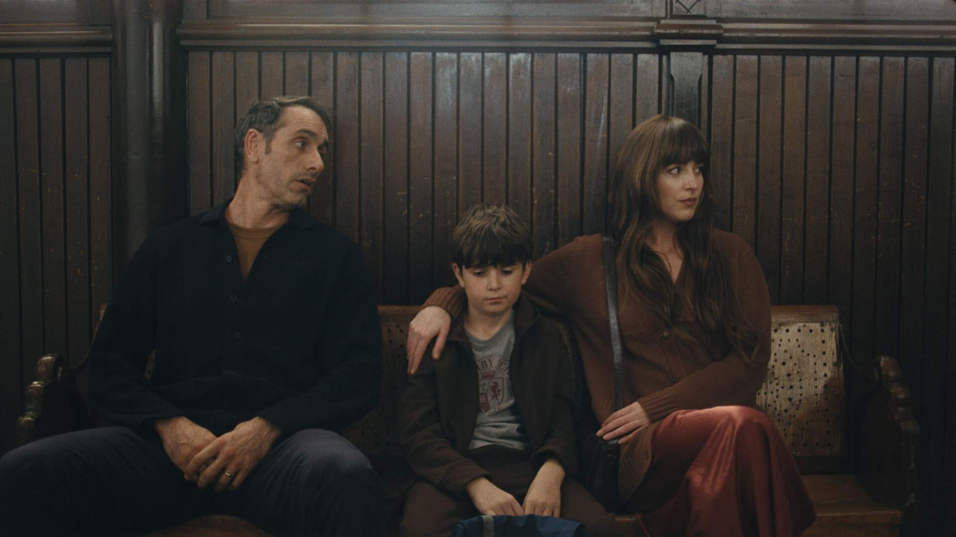 From left: Michael Angelo Covino, Simon Webster and Dakota Johnson in "Splitsville." (Courtesy NEON)