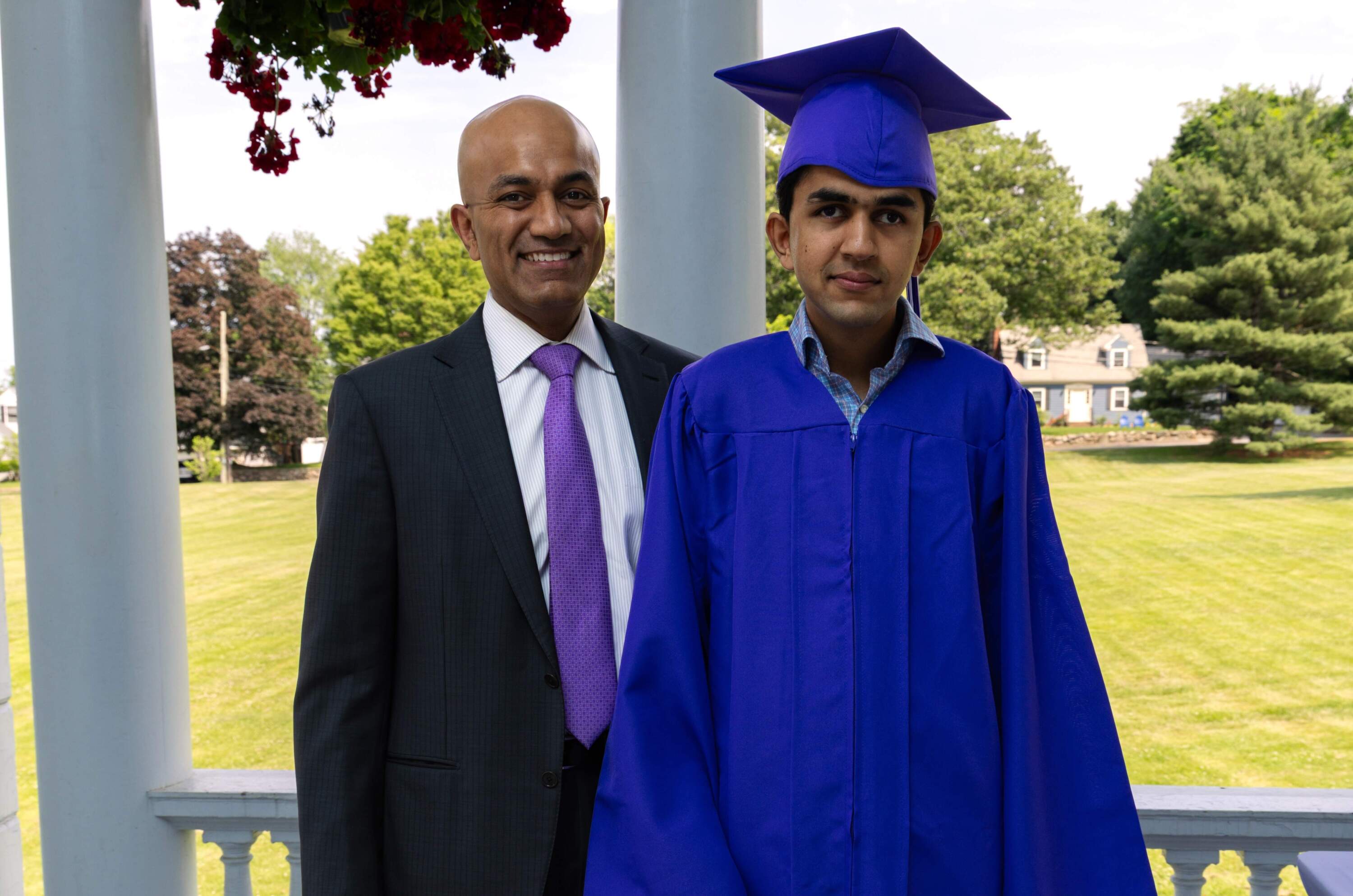 Viraj Dhanda (R) with his father Sumit Dhanda (L) at Viraj's high school graduation. (Courtesy of Sumit Dhanda)