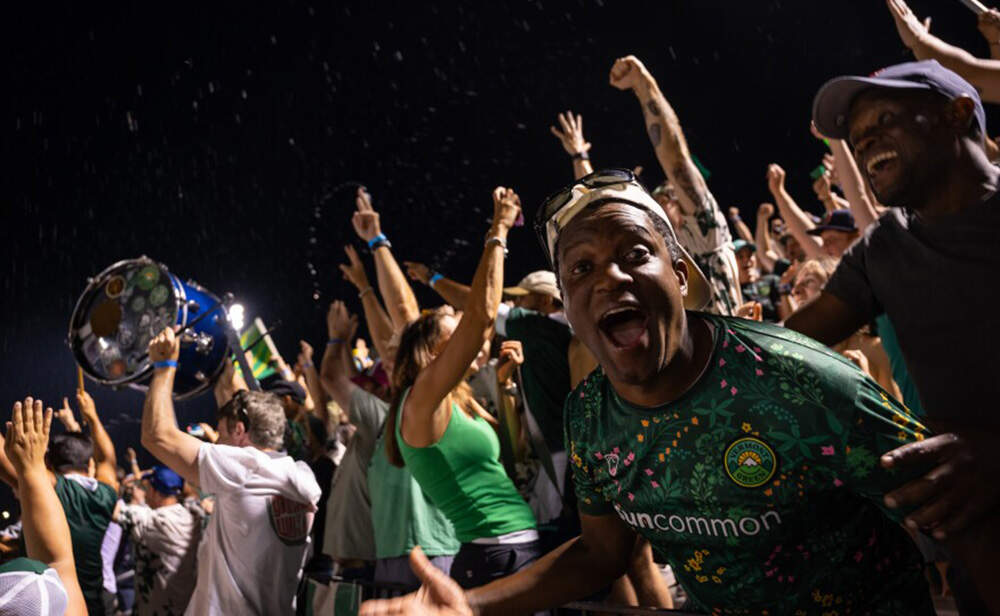 Vermont Green fans celebrate at the League Two national championship. (Brian Stevenson/Vermont Public)