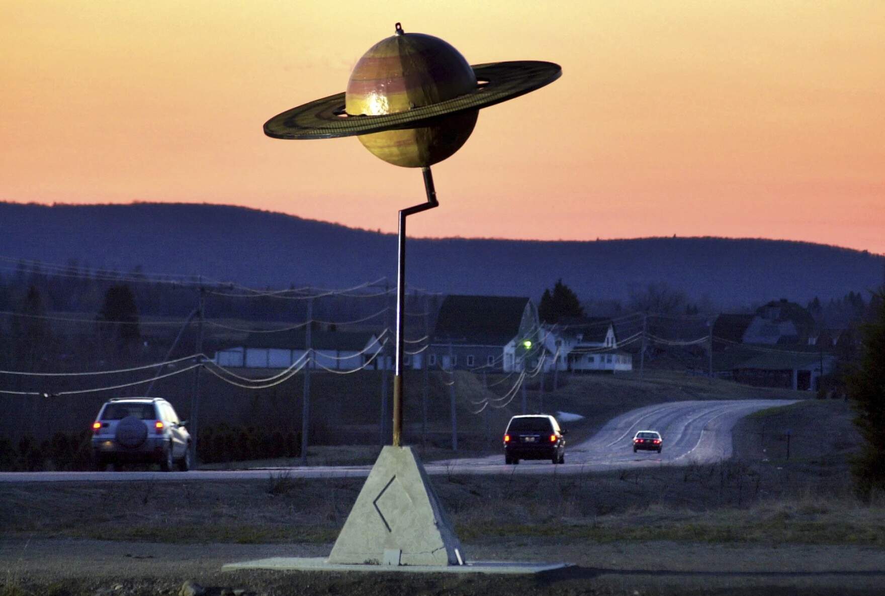 A model of the planet Saturn stands near Route 1 in Westfield, Maine, Friday, May 9, 2003. (Robert F. Bukaty/AP File)