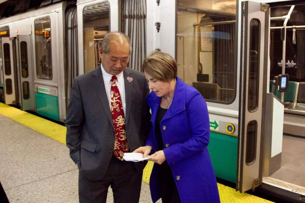 Gov. Maura Healey (right) greets MBTA General Manager Phil Eng after exiting a Green Line train at North Station on Feb. 12, 2024. (SHNS)