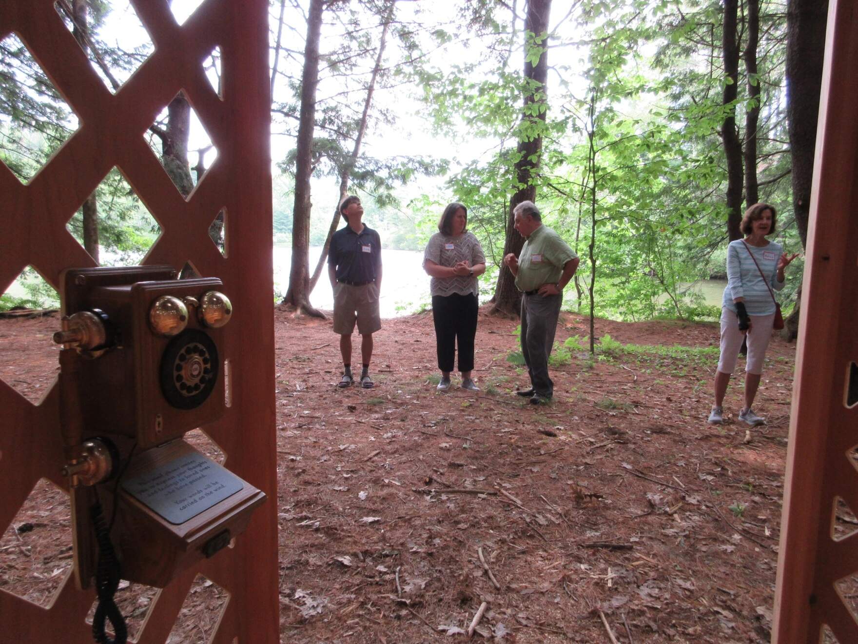 The Montshire Museum set up a phone booth along the Connecticut River this summer that’s meant to help people cope with loss. It was designed and built by college students. (Lexi Krupp/Vermont Public)