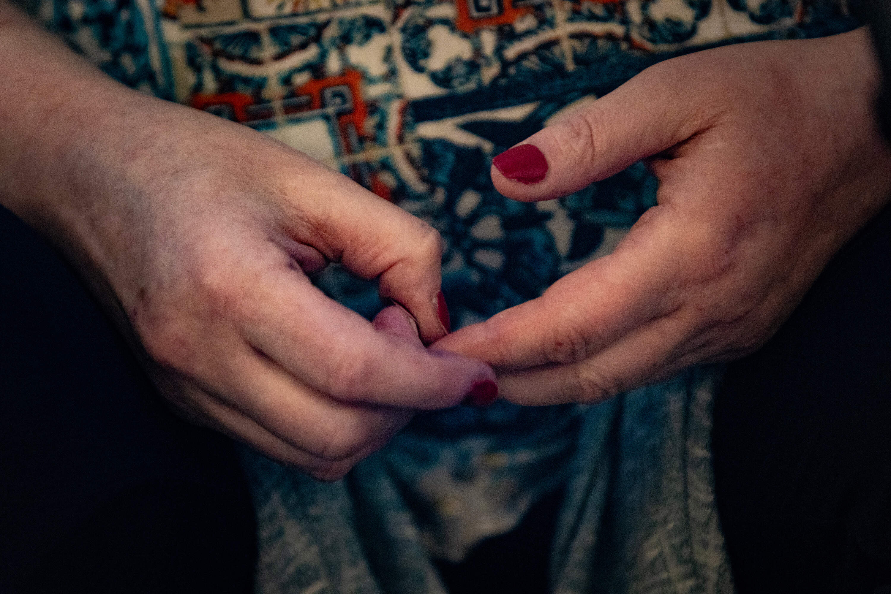 Louise shares how police told her they identified her alleged rapist, nearly two decades after her attack. WBUR is using her middle name to identify her, and is not showing her face. (Jesse Costa/WBUR)