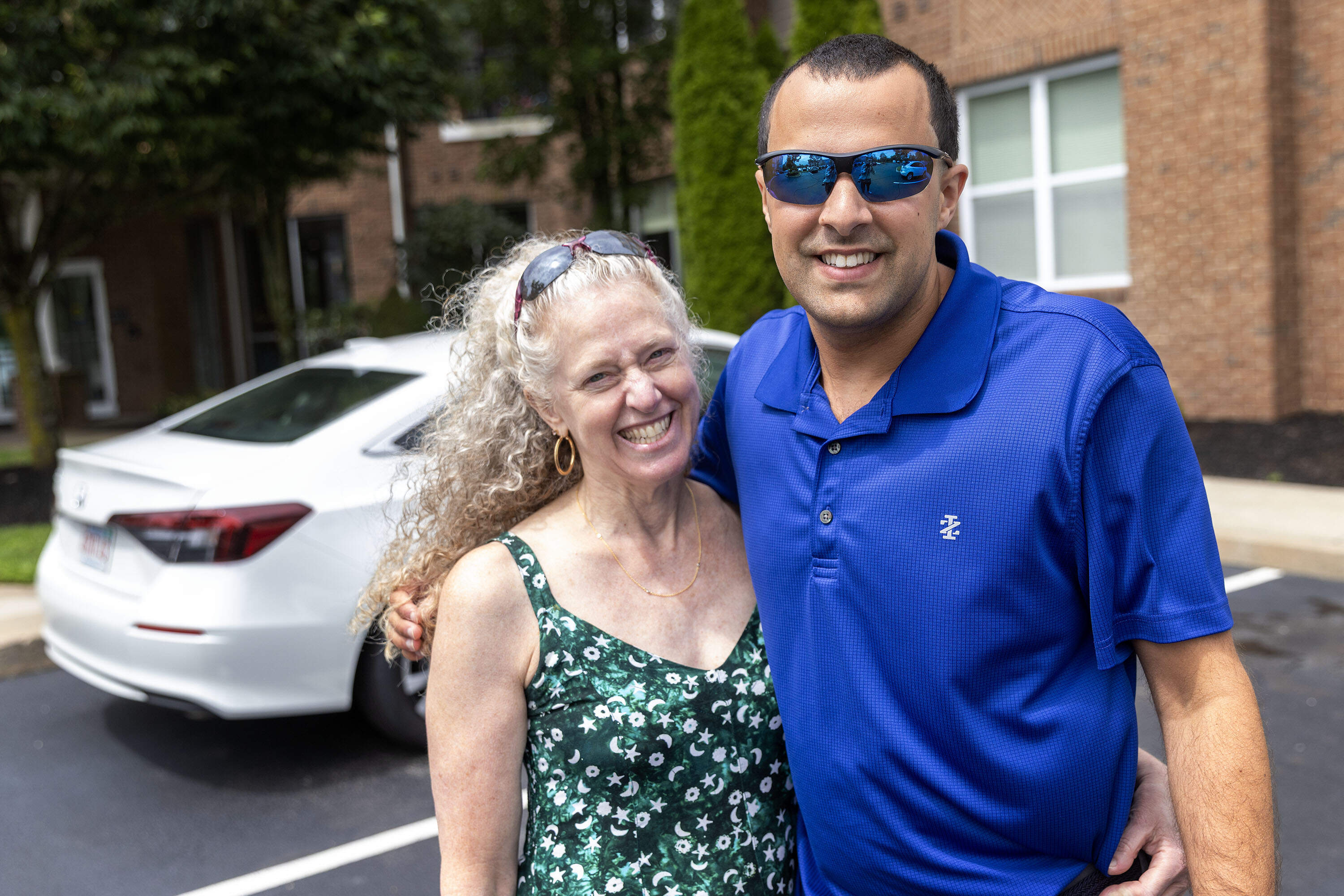 Ilyse Levine-Kanji with her son, Sam, at his home in Plymouth. (Robin Lubbock/WBUR)