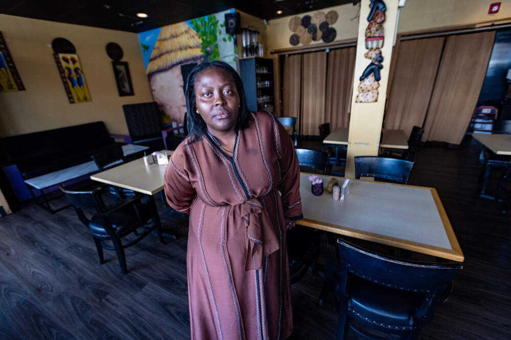 Restaurant owner Cecelia Lizotte inside Suya Joint in Roxbury. (Jesse Costa/WBUR)