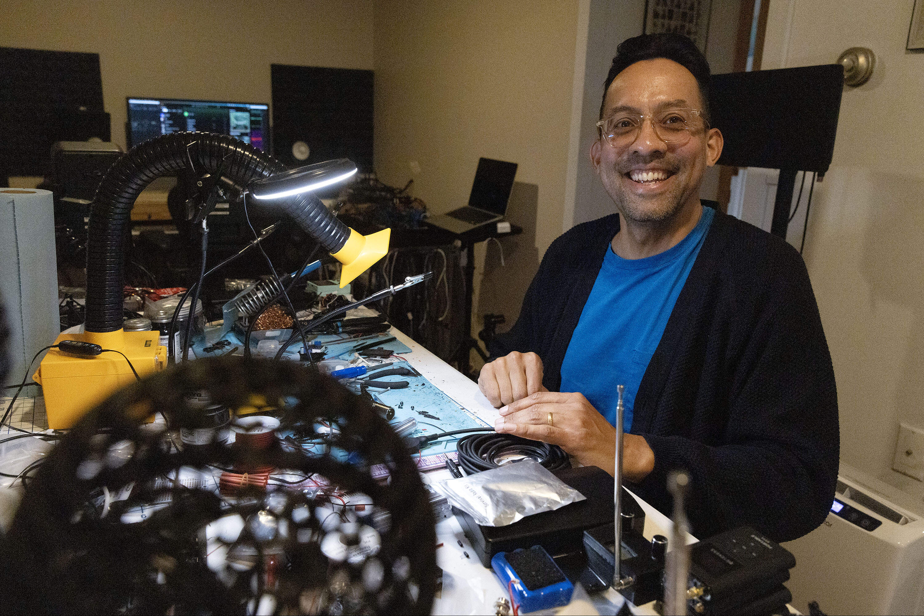 Sound designer and artist Skooby Laposky at his audio workbench in his studio in Cambridge. (Robin Lubbock/WBUR)