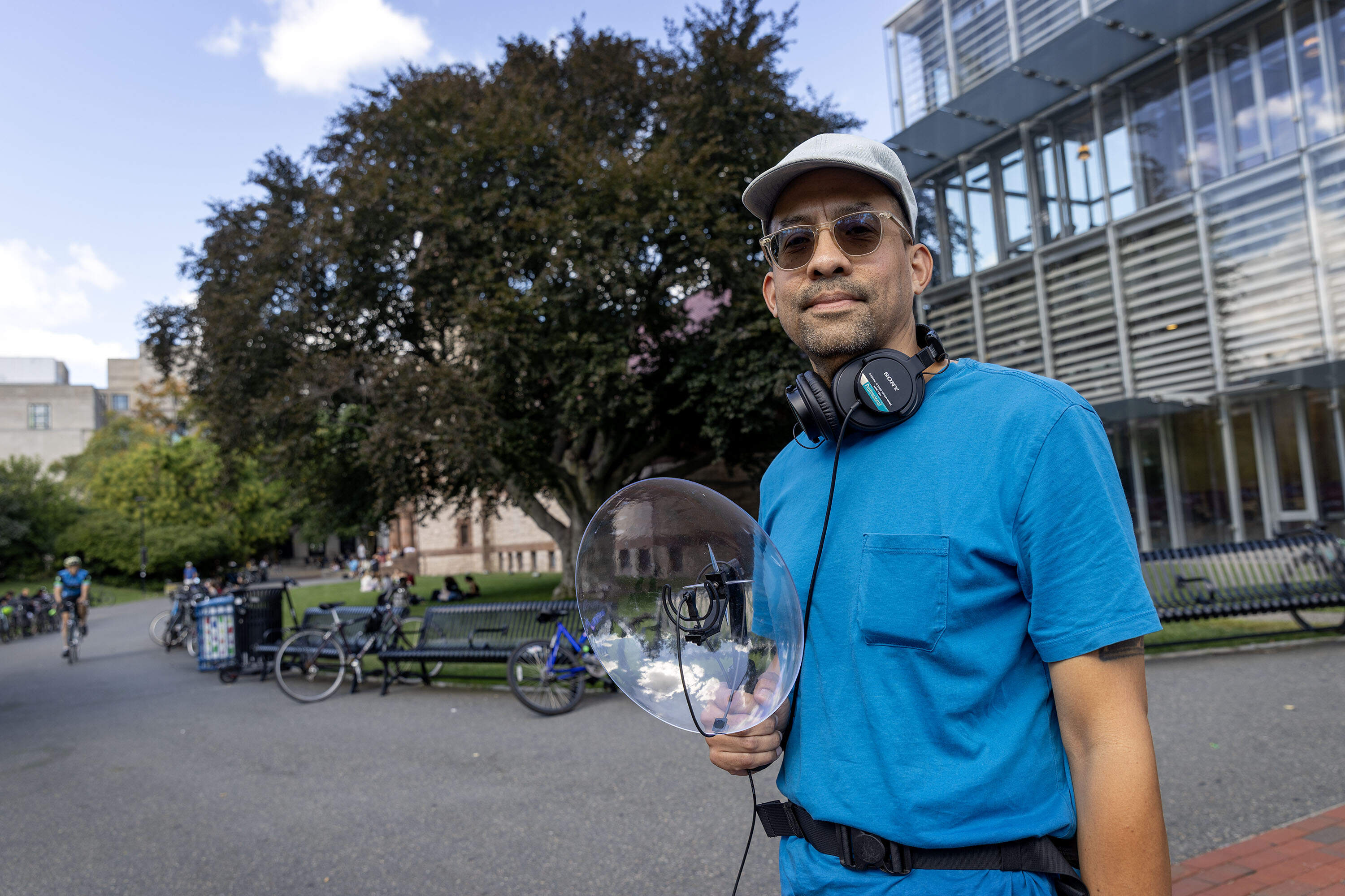 Laposky stands by copper beech tree he used in a long term recording project in Cambridge, Mass. (Robin Lubbock/WBUR)