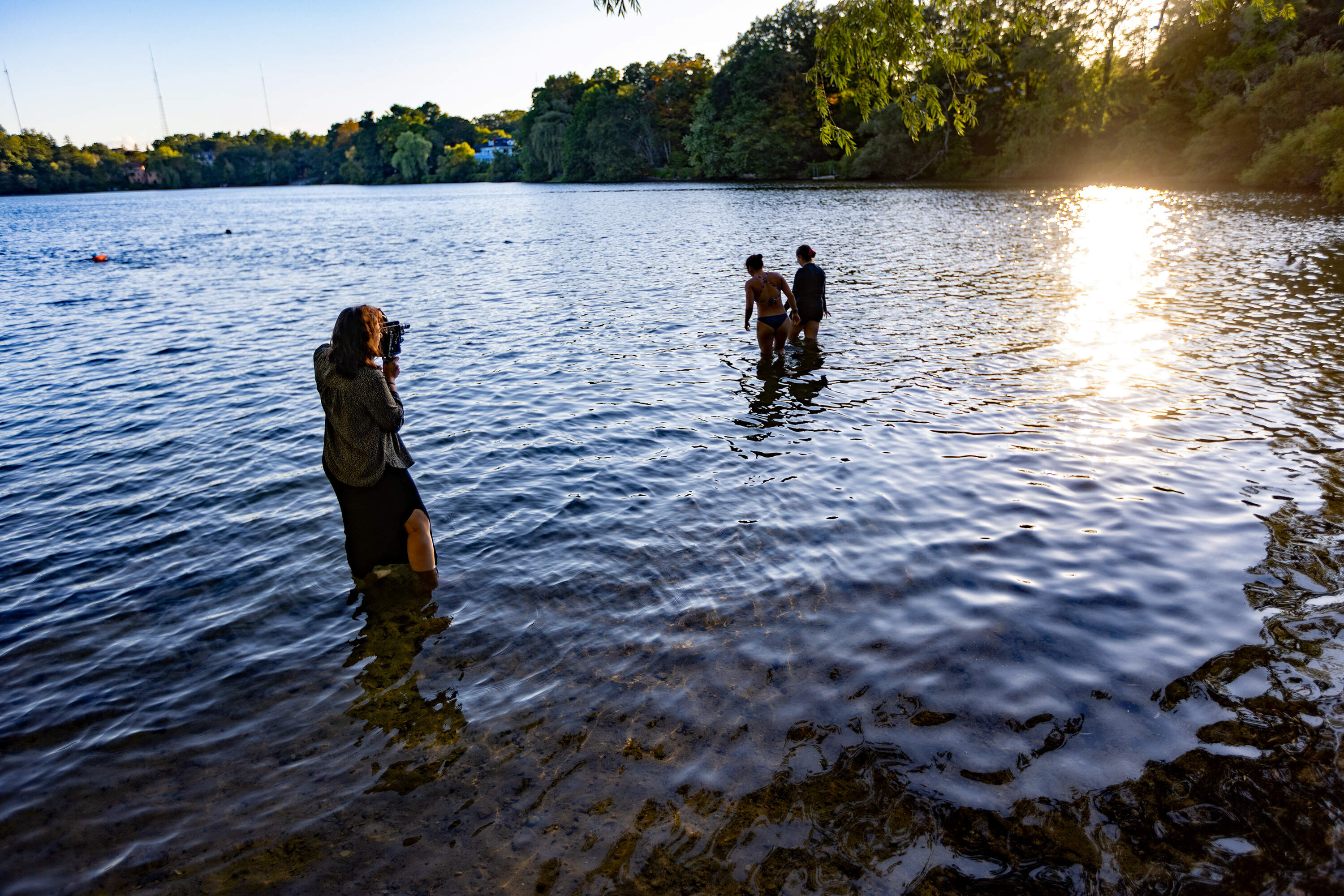 Sarabi films two friends going for a early evening swim at Crystal Lake in Newton for her latest project. (Jesse Costa/WBUR)