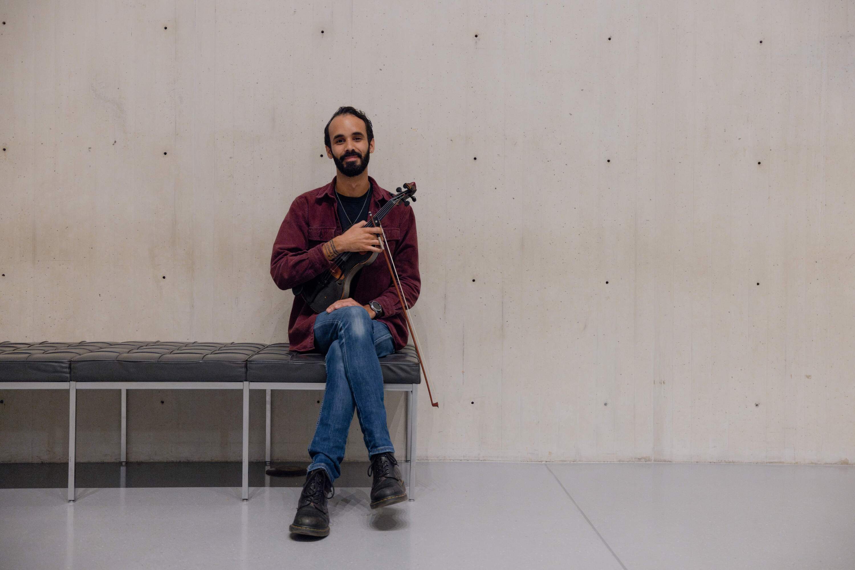 Jake Blount at the Museum of Fine Arts, Boston. (Olivia Moon for WBUR)