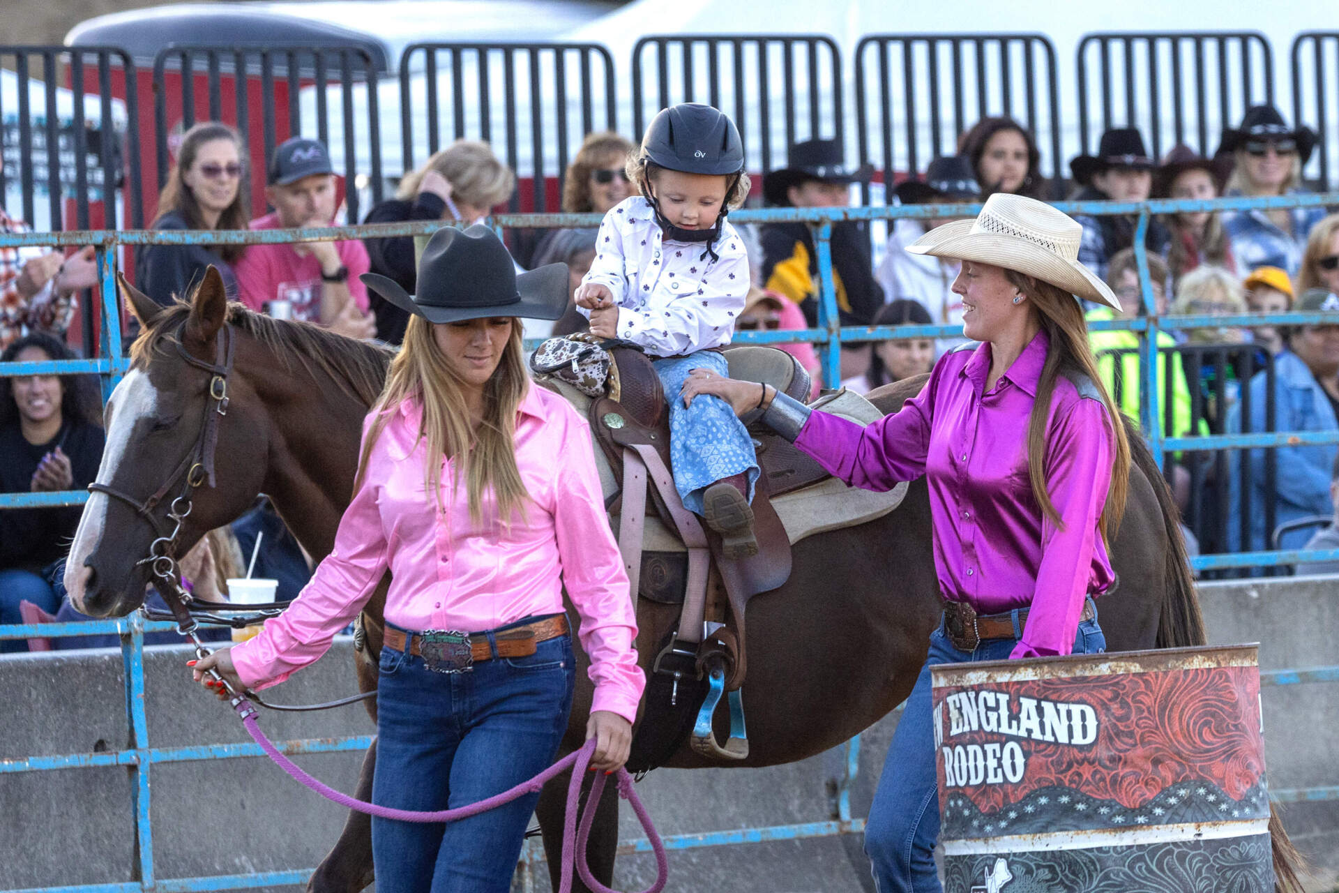 The rodeo begins with 3-year old Kinsey Lee during the assisted barrel racing competition. (Jesse Costa/WBUR)