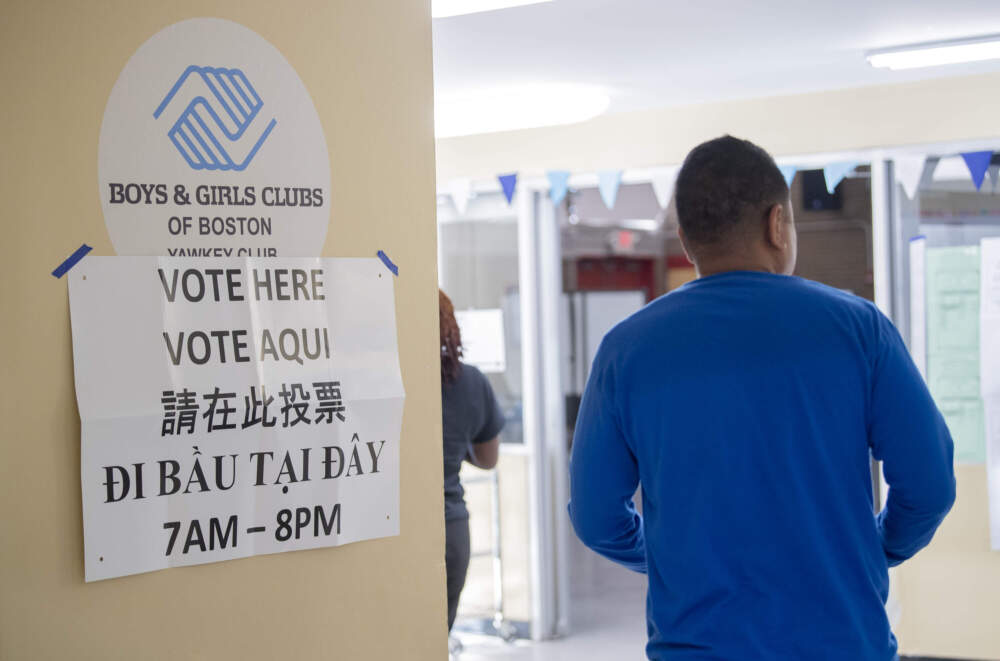 Voters arrive to cast their ballots at the Boys and Girls Club of Boston’s Yawkey Club of Roxbury in Boston’s Ward 12. (Amanda Sabga for WBUR)