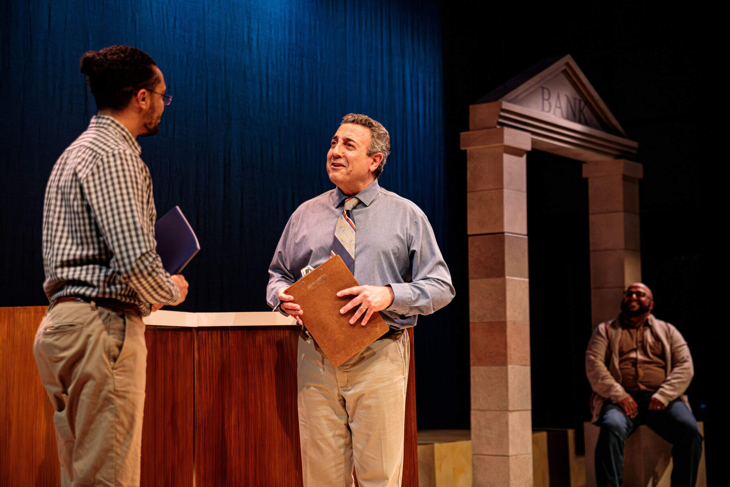 From left: David J. Castillo, Luis Negrón and Arthur Gomez in SpeakEasy Stage Company's "Primary Trust." (Courtesy Benjamin Rose Photography)