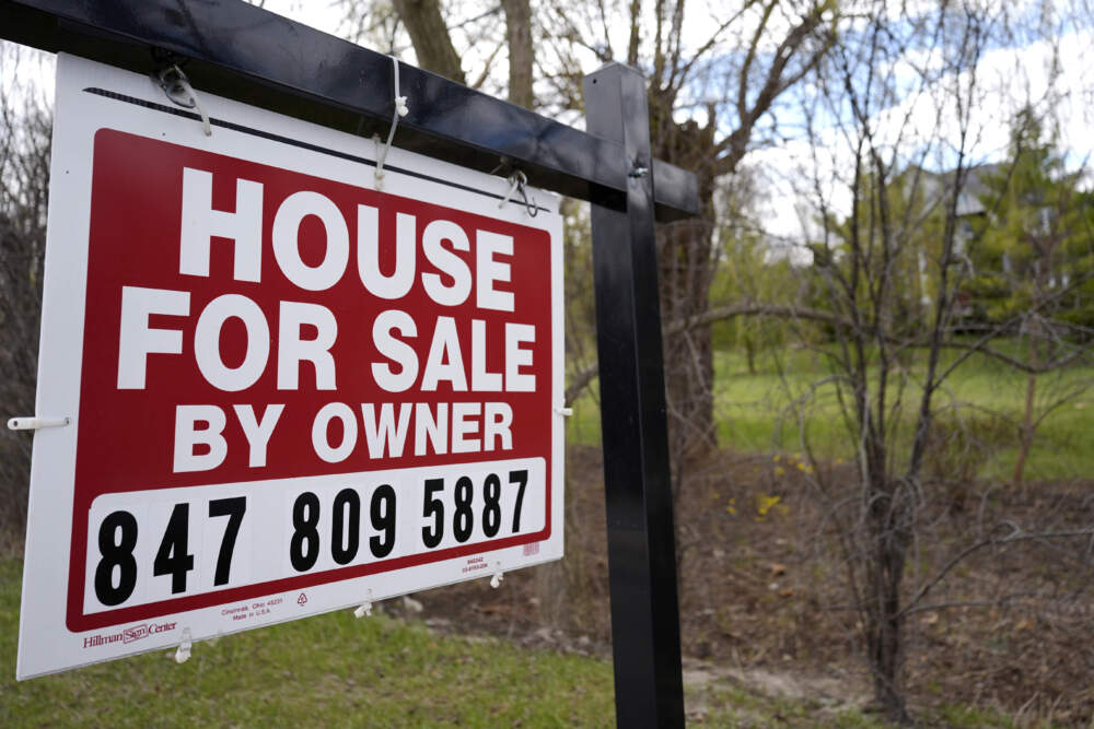A sign announcing a house for sale is displayed in Prospect Heights, Ill., on March 18, 2024. (Nam Y. Huh/AP)