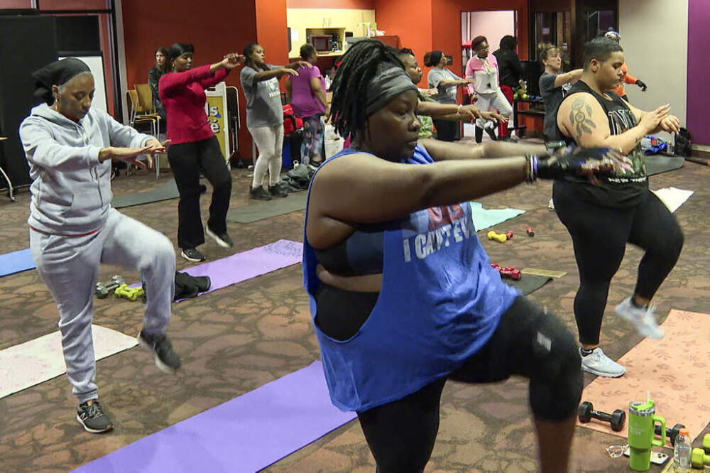 Patrons exercise during a fitness class at the public library in Kansas City, Mo., on Nov. 19, 2024. (Nick Ingram/AP)