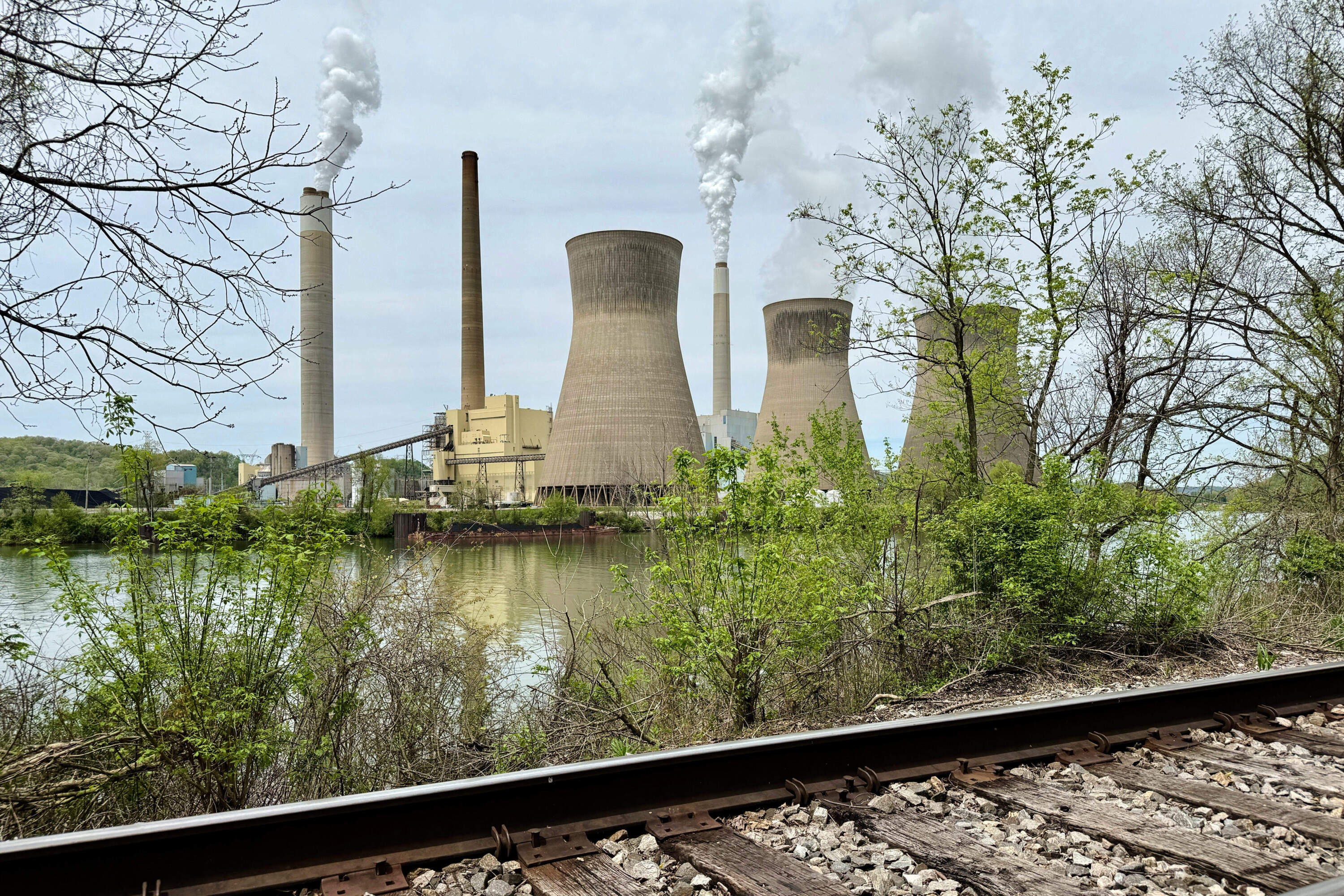 American Electric Power's John Amos coal-fired plant in Winfield, W.Va, is seen from the town of Poca across the Kanawha River, Tuesday, April 22, 2025. (John Raby/AP)