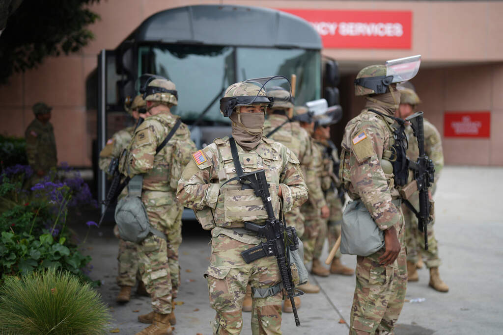 U.S. National Guard troops are deployed around downtown Los Angeles in June, following an immigration raid protest the night before. (Eric Thayer/AP)