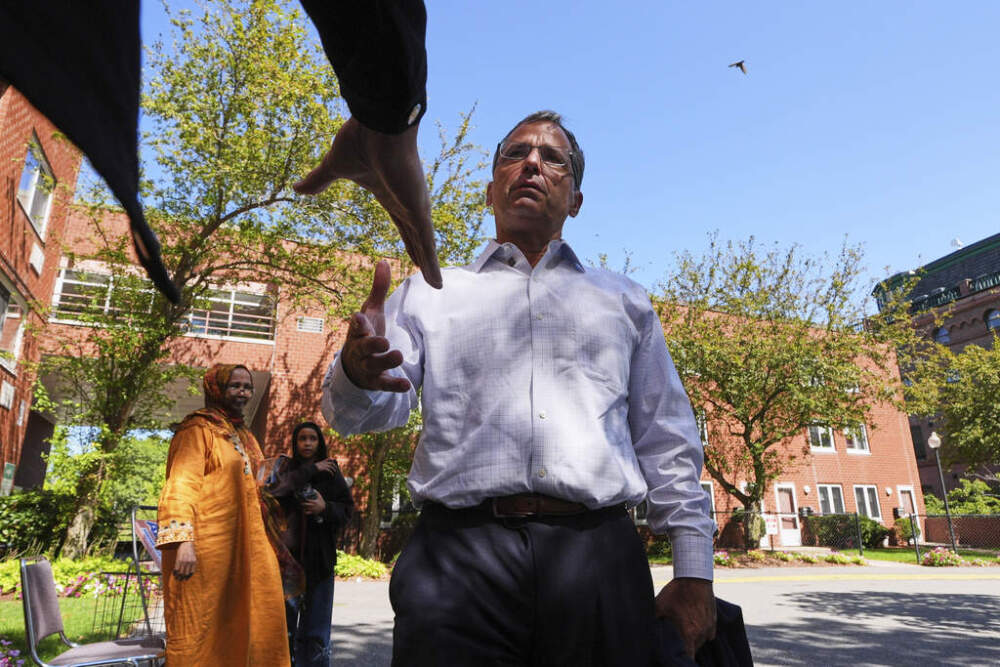 Boston mayoral candidate Josh Kraft campaigns outside a polling place in Roxbury Tuesday morning. (Charles Krupa/AP)