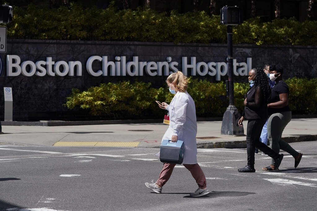 Pedestrians walk past Boston Children's Hospital. (Charles Krupa/AP File)