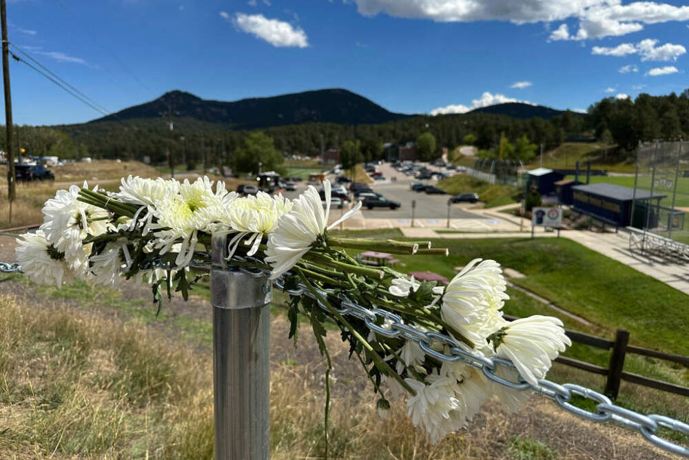Flowers left in remembrance of those wounded in a shooting at Evergreen High School in Evergreen, Colorado, on September 11. (Colleen Slevin/AP)