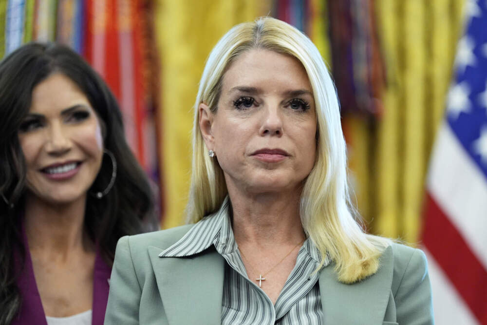 Attorney General Pam Bondi, right, and Homeland Security Secretary Kristi Noem listen as President Donald Trump speaks in the Oval Office of the White House, Monday, Sept. 15, 2025, in Washington. (Alex Brandon/AP)