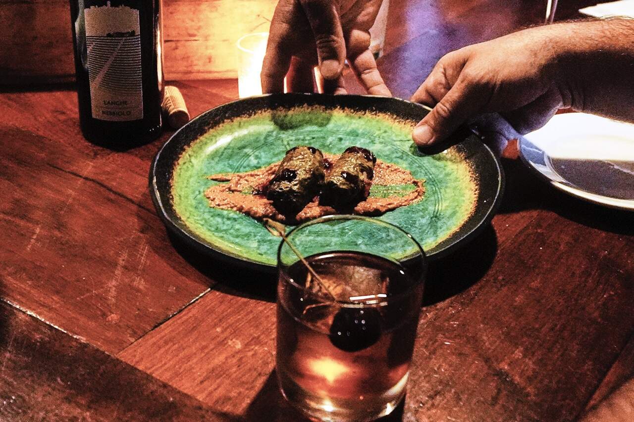 A Dolma appetizer, created with locally foraged grape leaves, are served to a patron at the Black Trumpet restaurant in Portsmouth, N.H. (Charles Krupa/AP)