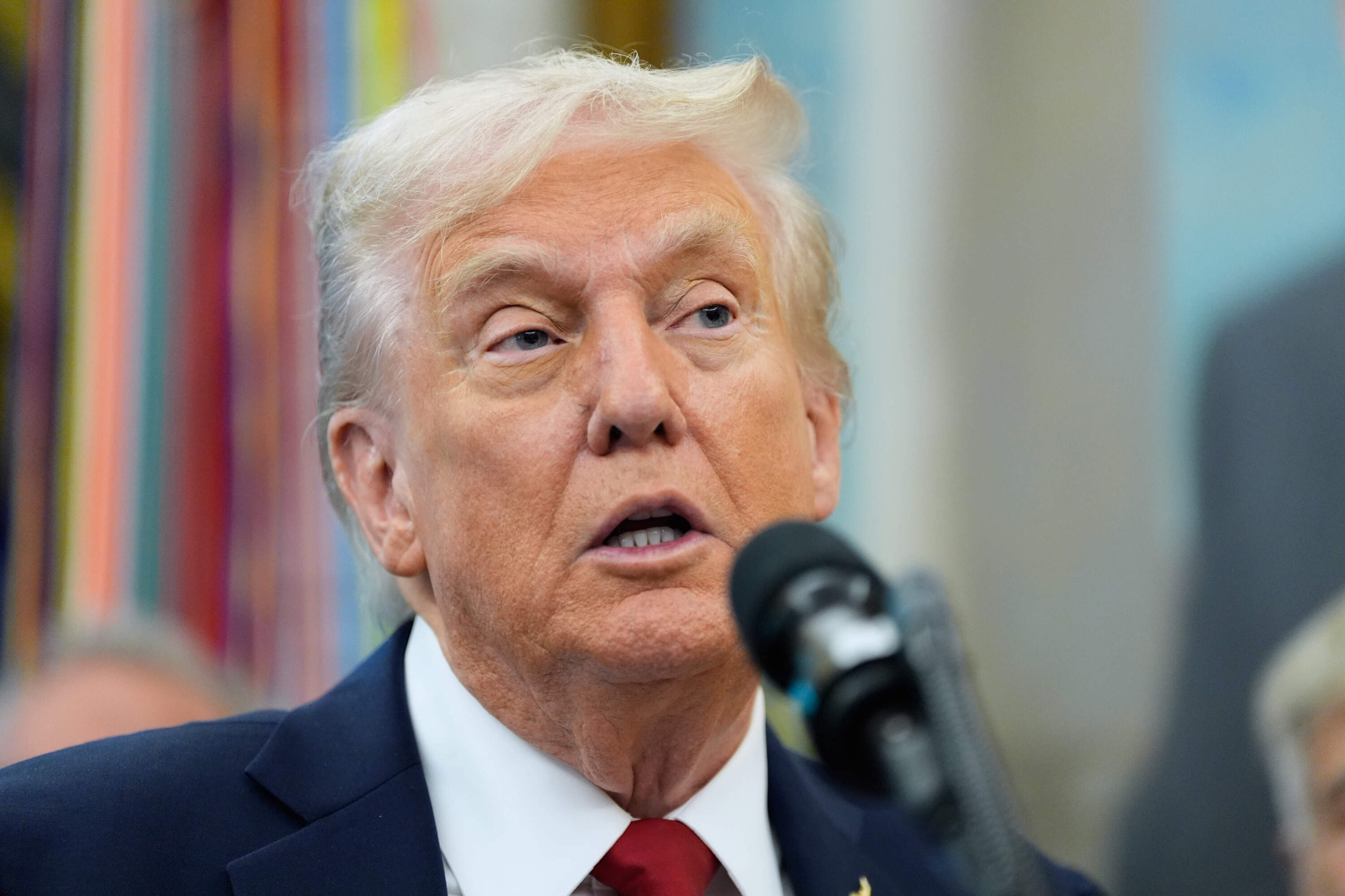 President Donald Trump speaks in the Oval Office on Sept. 30. (Alex Brandon/AP)