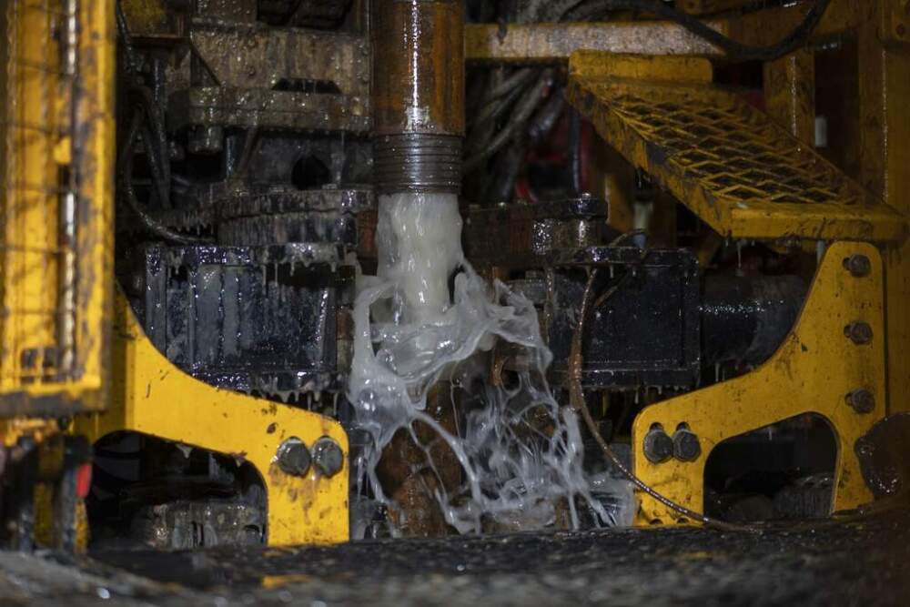 Residual water gushes from the Expedition 501 wireline core drilling rig during an operation aboard the Liftboat Robert platform, in the North Atlantic, Sunday, July 20, 2025. (Carolyn Kaster/AP)