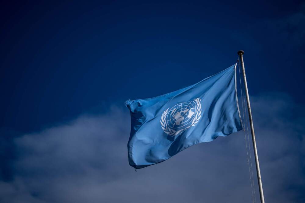 A flag of the United Nations flutters at the main entrance of the "Palais des Nations" building which houses the United Nations Office at Geneva, on Oct. 20, 2023. (Photo by Fabrice Coffrini/AFP via Getty Images)
