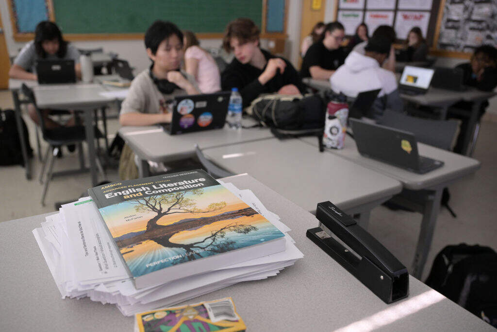 11th grade students discuss about essay for English class final exam at Thomas Jefferson High School in Denver, Colorado on Thursday, May 2, 2024. ( Hyoung Chang/The Denver Post via Getty Images)
