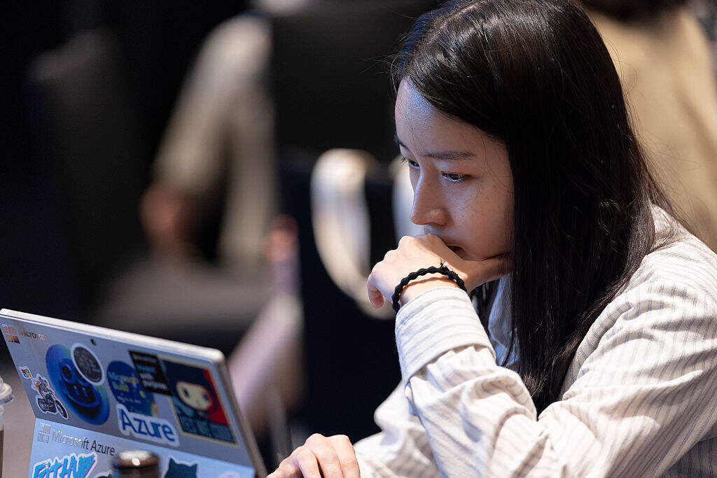 Participants listen to presentations during the side event "Open Source Day" at the Grand Hyatt Seoul in Seoul, South Korea, on September 15, 2025. This event continues GPA 2025 Seoul, addressing safe and responsible open-source AI use and encouraging collaboration between domestic SMEs and solution providers to advance the nation's AI ecosystem. (Photo by Chris Jung/NurPhoto via Getty Images)